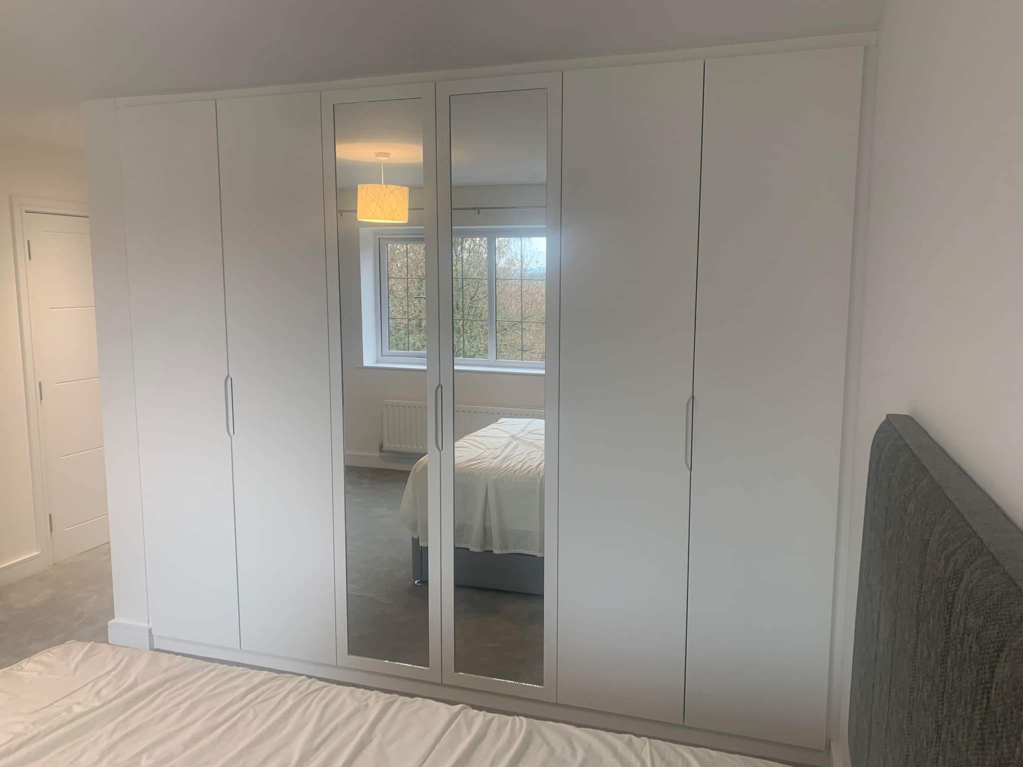 Bedroom Sleek fitted Wardrobe with Mirrored Doors
