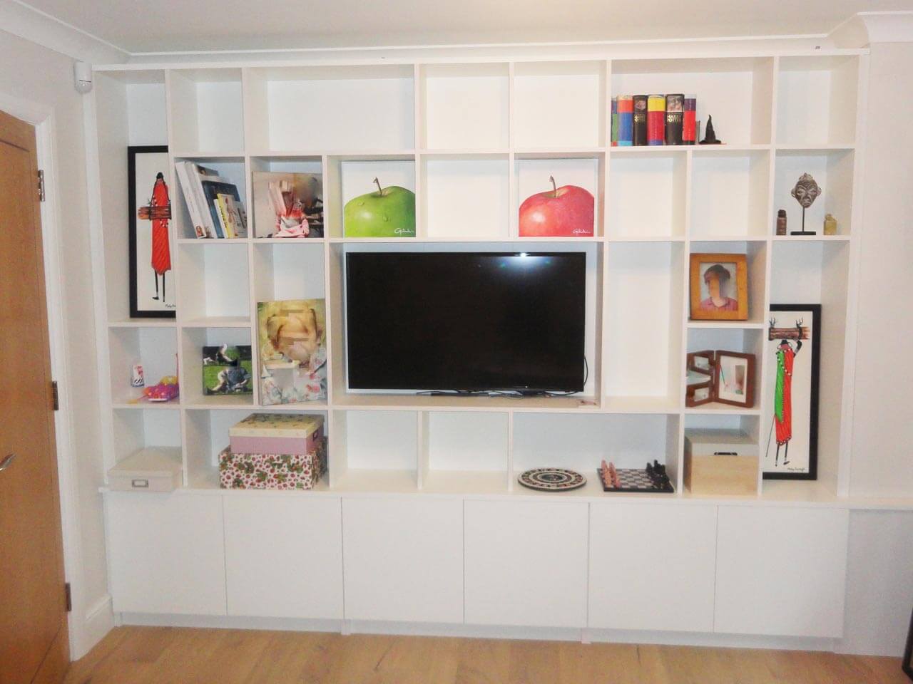 Media Room Unit with Shelves and Art Work