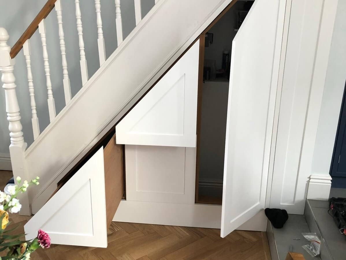 Under Stairs Storage with shoe racks and cloak room