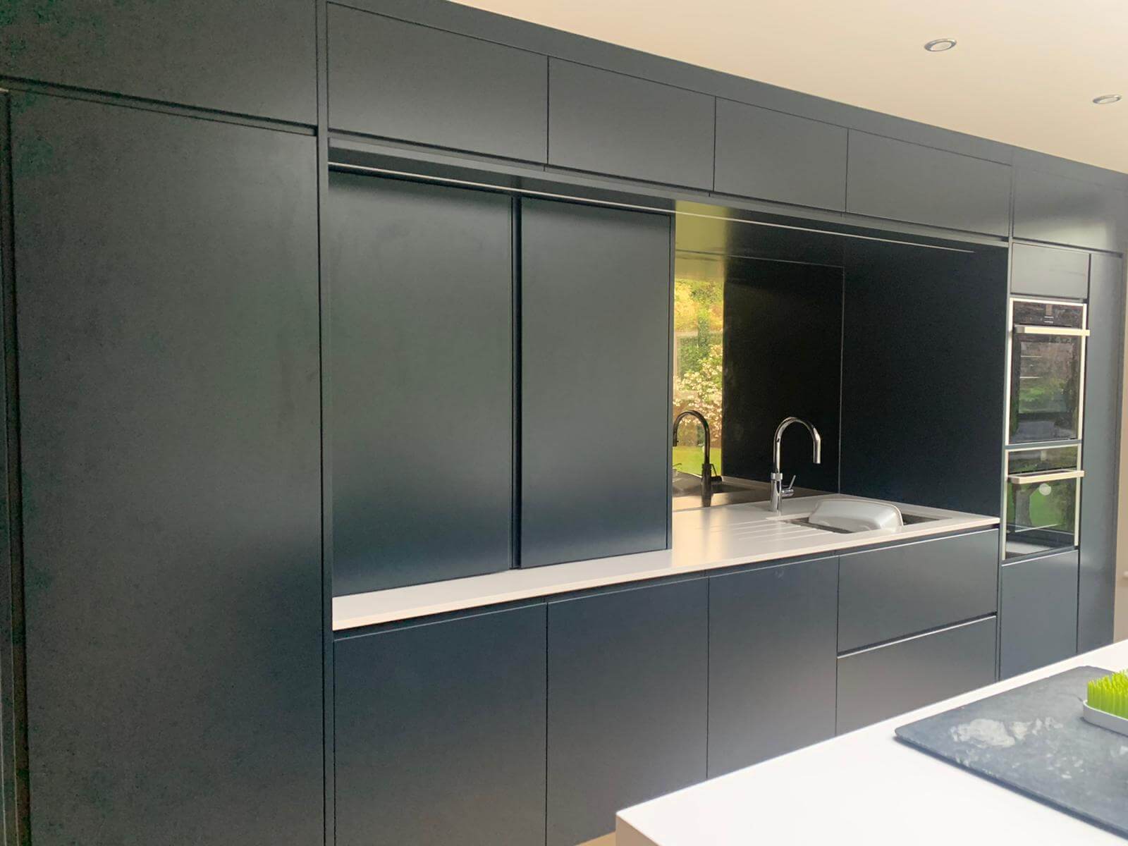 Dark Bespoke made to measure Fitted Kitchen and Appliances